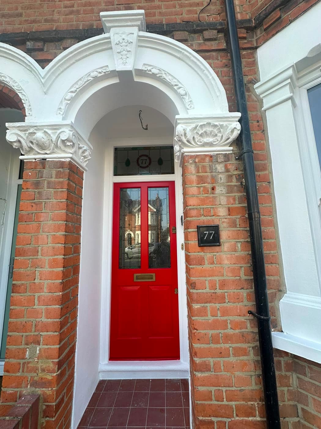 Beautifully repainted period reception room in a Surrey home, freshly decorated walls and woodwork